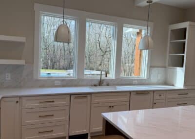 Kitchen sink with large windows overlooking pool Canton GA