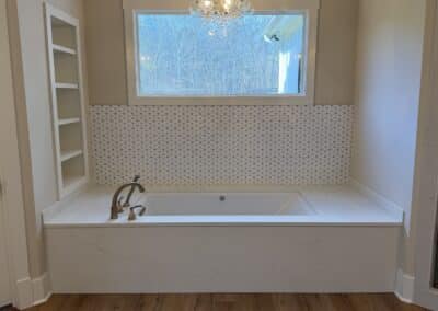 Master bathtub with marble surround in Canton GA custom home