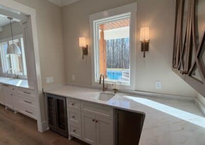 Wet bar with pool view in Canton GA custom home