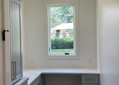 home office with blue cabinets and storage Gainesville GA