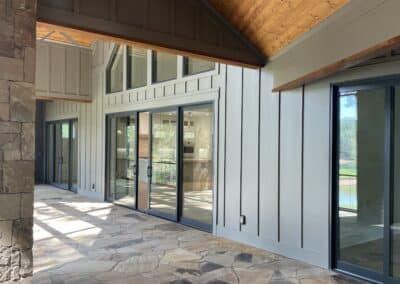 large sliding glass doors and wood siding Gainesville GA home